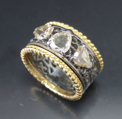 Bague anneau et diamants en deux ors 750‰...