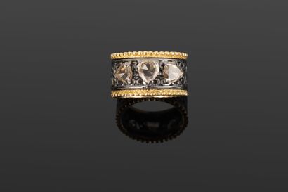 Bague anneau et diamants en deux ors 750‰...