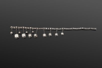 Partie de collier en or 750‰ et argent 925‰...