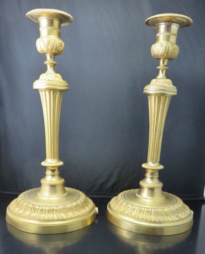 Deux paires de bougeoirs en bronze doré,...