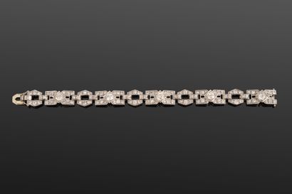 Bracelet en platine 950‰ et or gris 750‰...