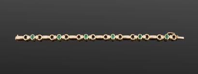 Bracelet en or jaune 750‰ serti d'émeraudes...