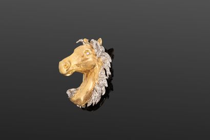 Broche en or brossé et satiné 750‰ stylisant...
