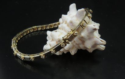 Bracelet ligne diamants en deux ors 750‰,...