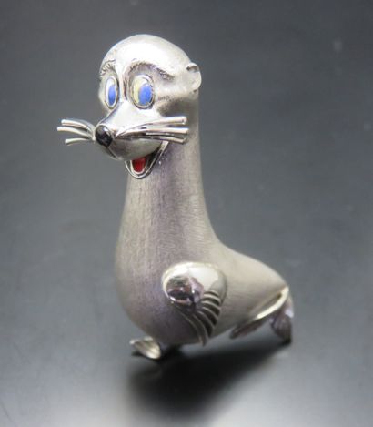 Broche en or gris brossé 750‰, stylisant...
