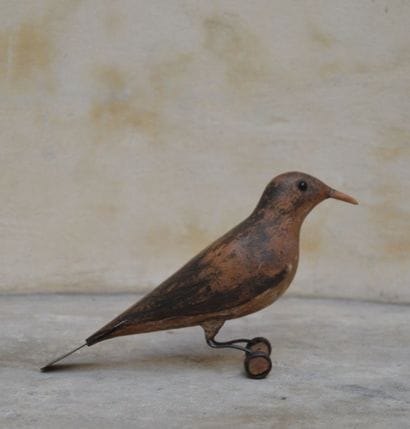 GRIVE MAUVIS, Appelant en bois sculpté, ailes...
