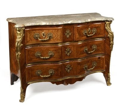 COMMODE galbée en marqueterie de palissandre...