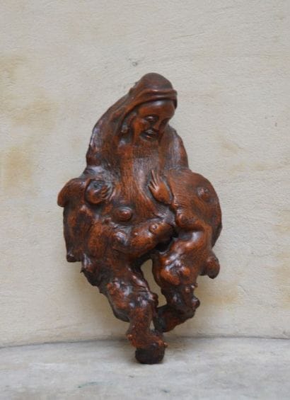 RACINE sculptée figurant un sage. Chine,...