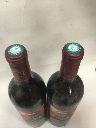 Un Lot de 2 Bouteilles de Château MONTUS...