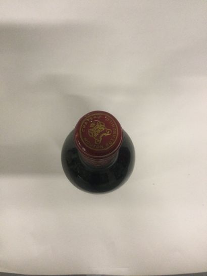 Une Bouteille Château Mouton Rothschild,...