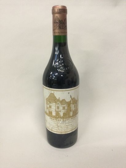 
Une Bouteille Château Haut Brion, cru classé...