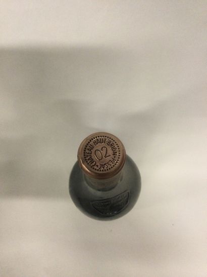 
Une Bouteille Château Haut Brion, cru classé...
