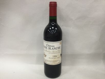 Une Bouteille Château Reine Blanche Saint...
