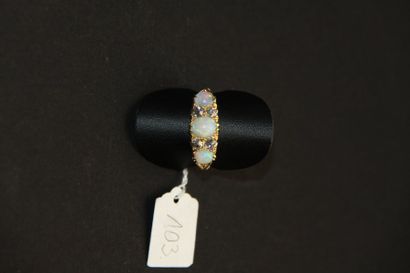 Bague jarretière ancienne en or jaune 18K...
