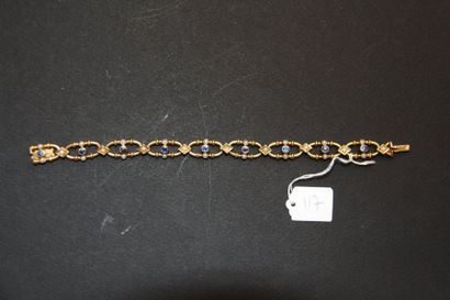Bracelet ancien en or jaune 18K (750/oo)...