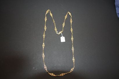 Long collier ancien en or jaune 18K (750/oo)...