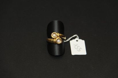 Bague croisée en or jaune 18K (750/oo) agrémentée...
