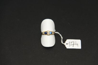 Bague jarretière ancienne en or jaune 9K...