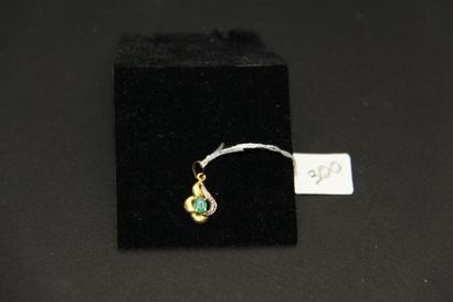 Pendentif en or 18K (750/oo) de deux tons...