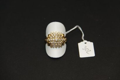 Bague en or jaune 18K (750/oo), la partie...
