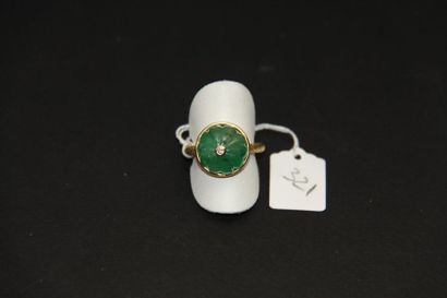 Bague en or jaune 18K (750/oo) guilloché...