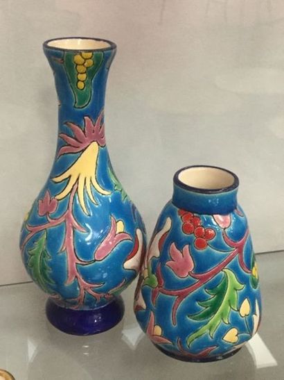 LONGWY, Deux vases en faïence à décor de...