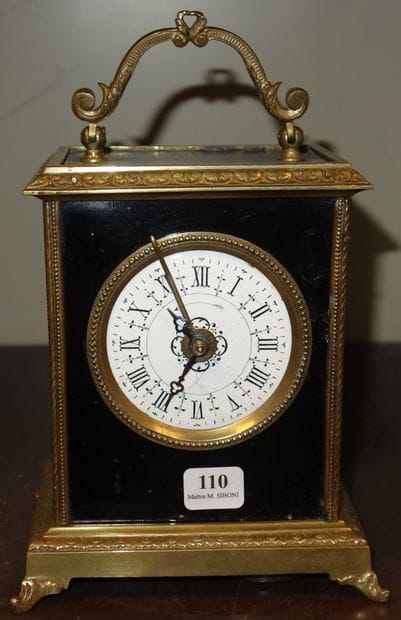 110- Pendule d'officier en métal doré Grand...