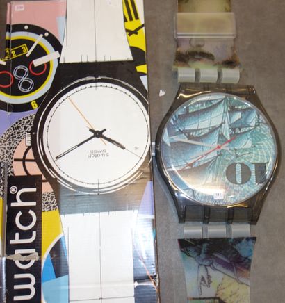 242- Pendule Swatch dans sa boîte d'orig...