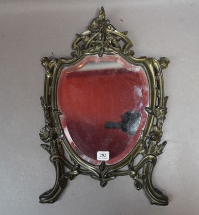 282- Miroir biseauté Cadre en métal argenté...
