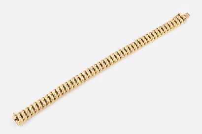 77- Curb in yellow gold. Pds: 19.75 g. Collection...