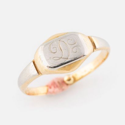 67- Yellow and white gold signet ring engraved...