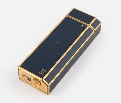 120- CARTIER Gilt metal and blue lacquered...