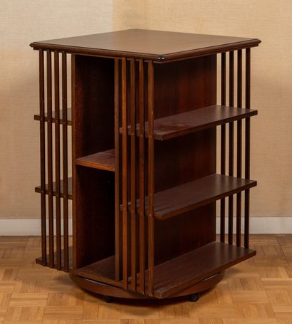 372- Wooden revolving bookcase. 85 x 56 cm....