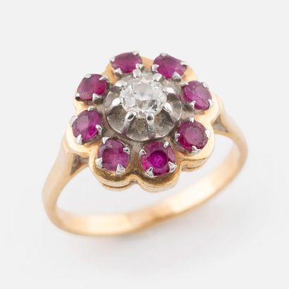 91- Yellow gold ring set with a diamond surrounded...