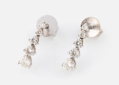 92- Pair of earrings each set with 5 falling...