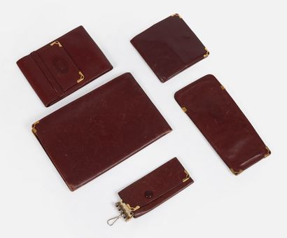 183- Must de CARTIER Burgundy leather clutch,...