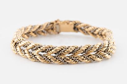 76- Bracelet in 2-tone gold. Weight: 21.15...