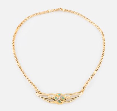64- Yellow gold necklace with a central motif...