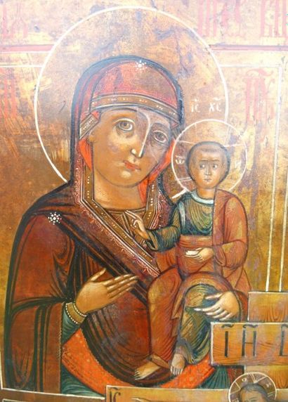 Icône représentant: au centre le Christ en...
