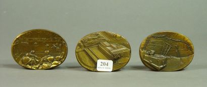 204- Trois médailles en bronze commémoratives...