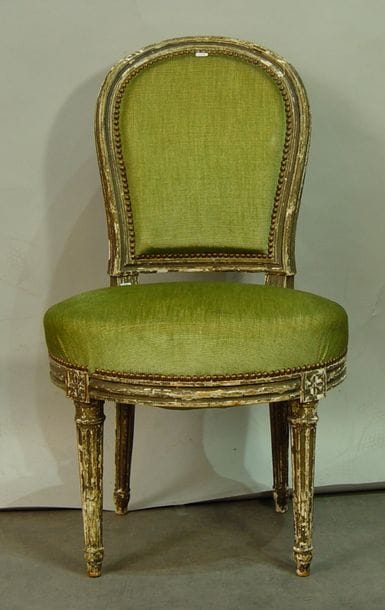 314- Chaise en bois mouluré et laqué

Epoque...
