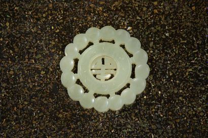 Round shaped medallion in celadon nephrite,...