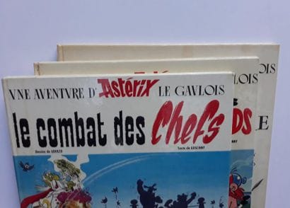 Astérix 
ensemble de 3 albums : Le combat...