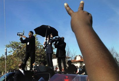 Michael Jackson supported by his fans, as...