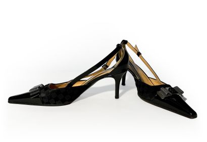 Louis Vuitton. Pair of patent leather and...