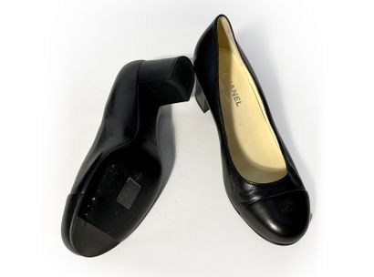 Chanel. Pair of navy blue leather pumps....