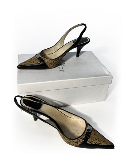 Christian Dior. Pair of navy blue leather...