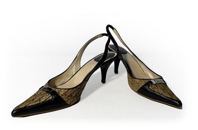 Christian Dior. Pair of navy blue leather...