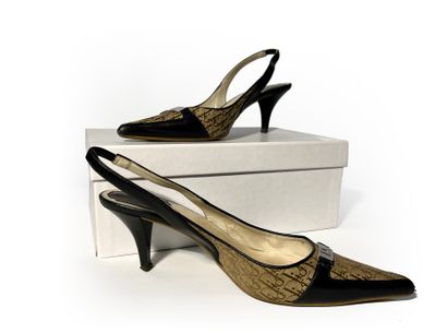 Christian Dior. Pair of navy blue leather...