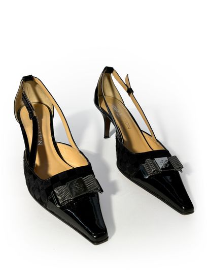 Louis Vuitton. Pair of patent leather and...